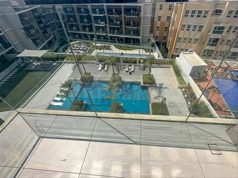 Apartment for Sale in Oxford Residence 1 - Jumeirah Village Circle, Dubai - Pool view | Furnished | Top floor at 739000 AED