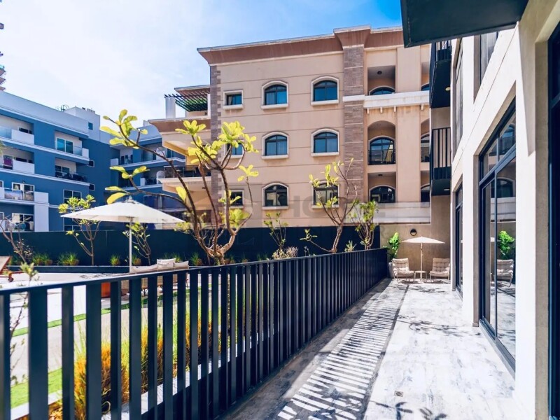 Apartment for Sale in Beverly Residence 1 - Jumeirah Village Circle, Dubai - Pool View | Bright Unit | Fully Furnished at 3789999 AED