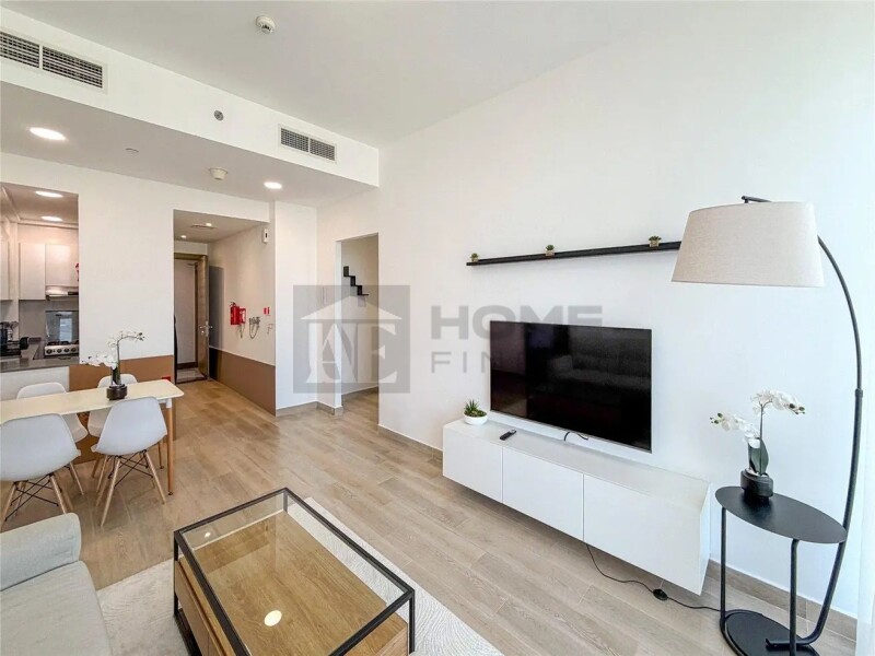 Apartment for Rent in Bloom Tower B - Jumeirah Village Circle, Dubai - Fully Furnished | 12 cheques | Balcony | Pool View at 85000 AED