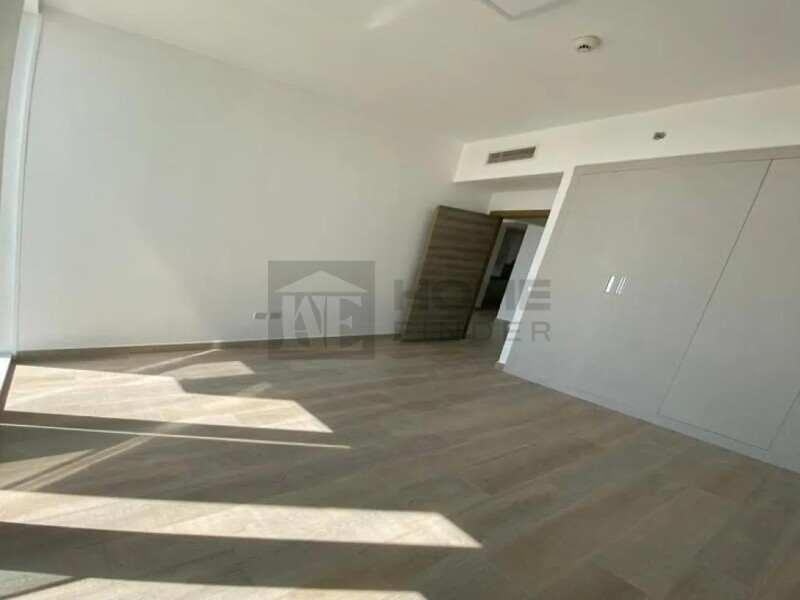 Apartment for Rent in Bloom Tower B - Jumeirah Village Circle, Dubai - Unfurnished |Prime Location |Community View at 74999 AED