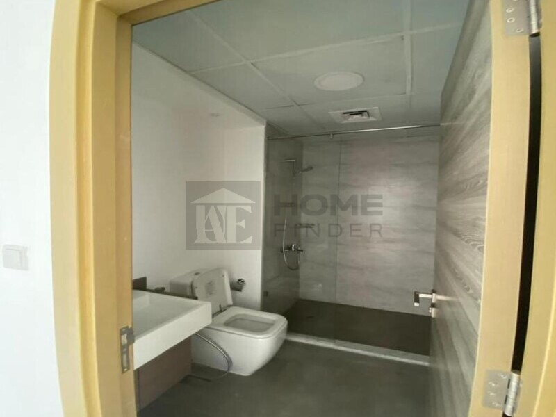 Apartment for Rent in Bloom Tower B - Jumeirah Village Circle, Dubai - Unfurnished |Prime Location |Community View at 74999 AED