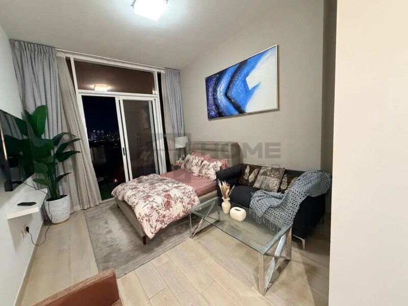 Apartment for Rent in Bloom Tower C - Jumeirah Village Circle, Dubai - Large Furnished Studio I Prime Location & Premium at 59000 AED