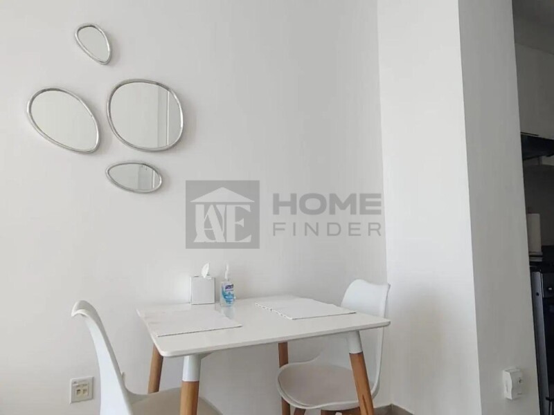 Apartment for Rent in Bloom Tower C - Jumeirah Village Circle, Dubai - Cozy and Chic | Bright Interiors | High Floor at 55000 AED