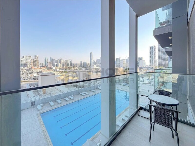 Apartment for Rent in Bloom Tower C - Jumeirah Village Circle, Dubai - Fully furnished |12 Cheques | Pool View at 81000 AED