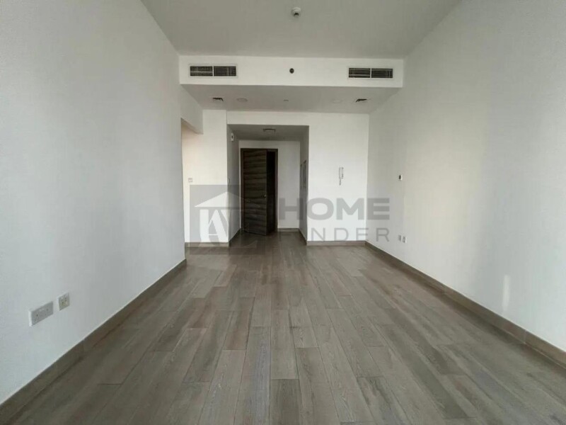 Apartment for Rent in Bloom Tower A - Jumeirah Village Circle, Dubai - Community View | Unfurnished 1BR| Ready to Move at 84999 AED