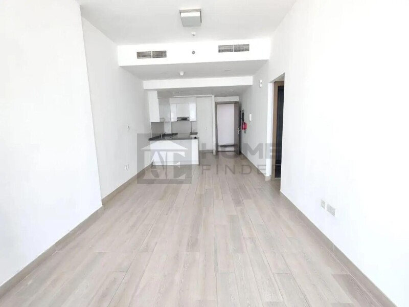 Apartment for Rent in Bloom Tower A - Jumeirah Village Circle, Dubai - Unfurnished 2BR | Prime location | Ready to move at 134999 AED