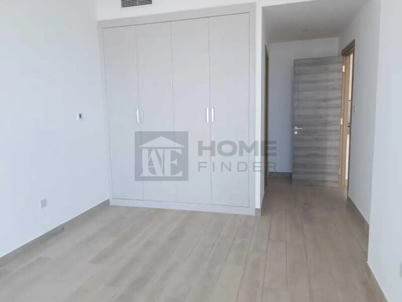Apartment for Rent in Bloom Tower A - Jumeirah Village Circle, Dubai - Unfurnished 2BR | Prime location | Ready to move at 134999 AED